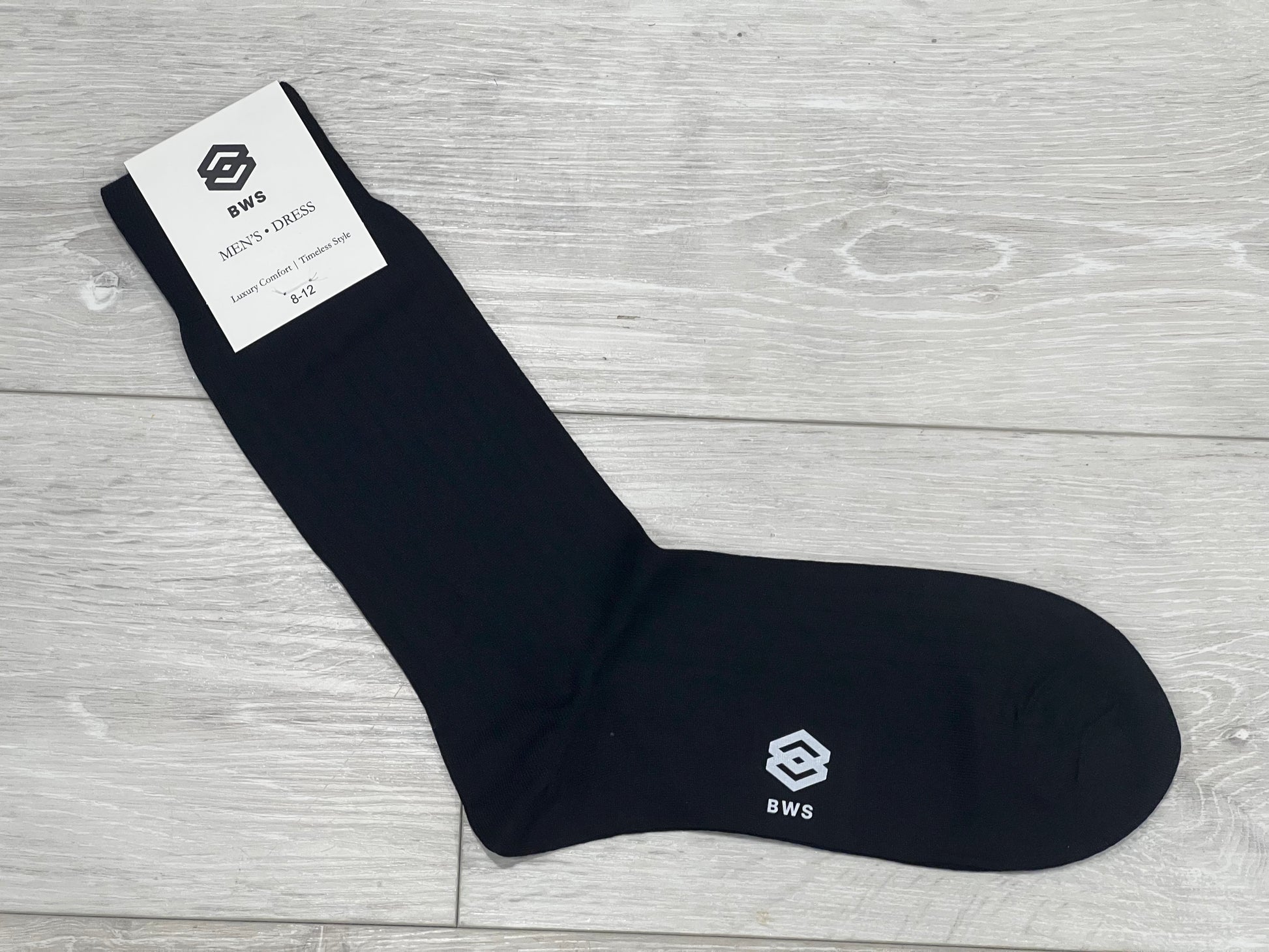 Black merino wool dress socks with a brand label